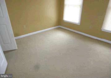 4763 Winchester Road The Plains, VA 20198 - Photo 9 of 12 an empty room with a window