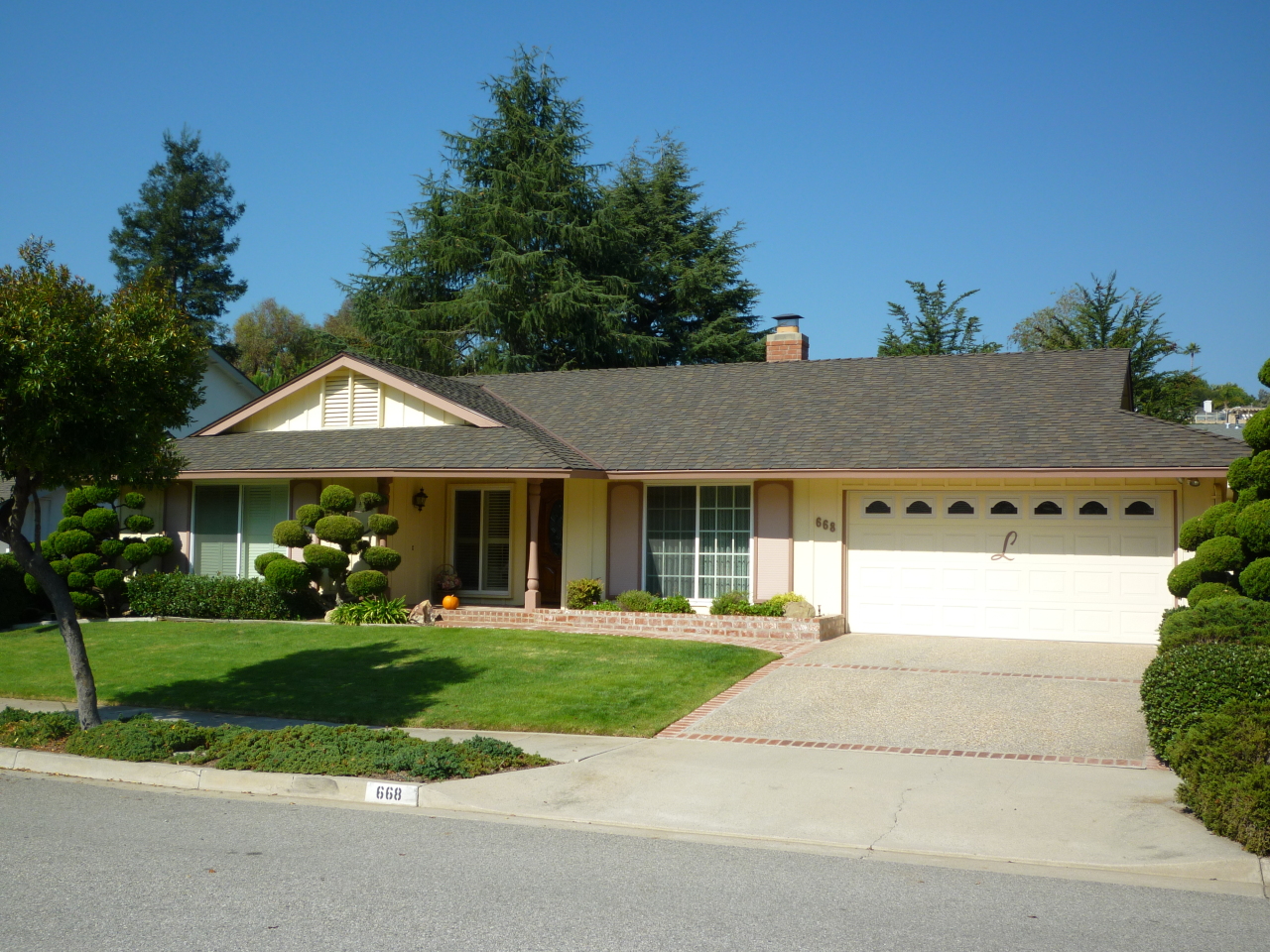 668 Wakefield Road Santa Barbara, CA 93117 - Photo 1 of 6 a front view of a house with a yard and trees