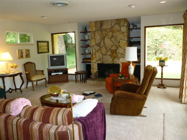 668 Wakefield Road Santa Barbara, CA 93117 - Photo 2 of 6 a living room with fireplace furniture and a large window