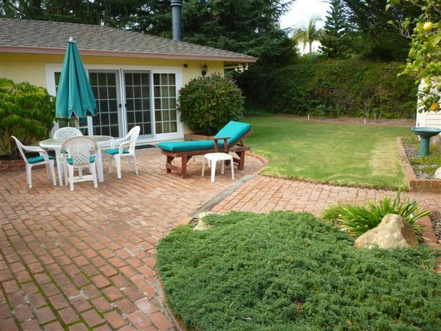 668 Wakefield Road Santa Barbara, CA 93117 - Photo 4 of 6 a view of a house with backyard sitting area and garden