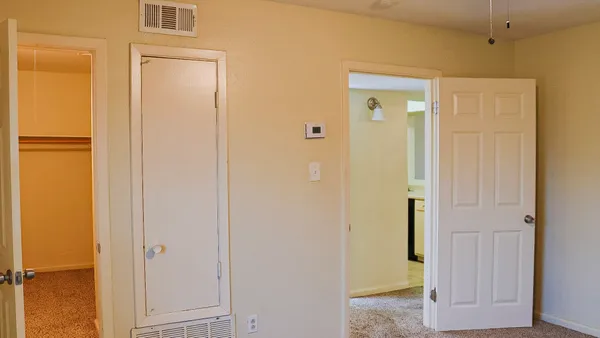 a bathroom with a glass door
