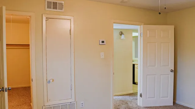 a bathroom with a glass door