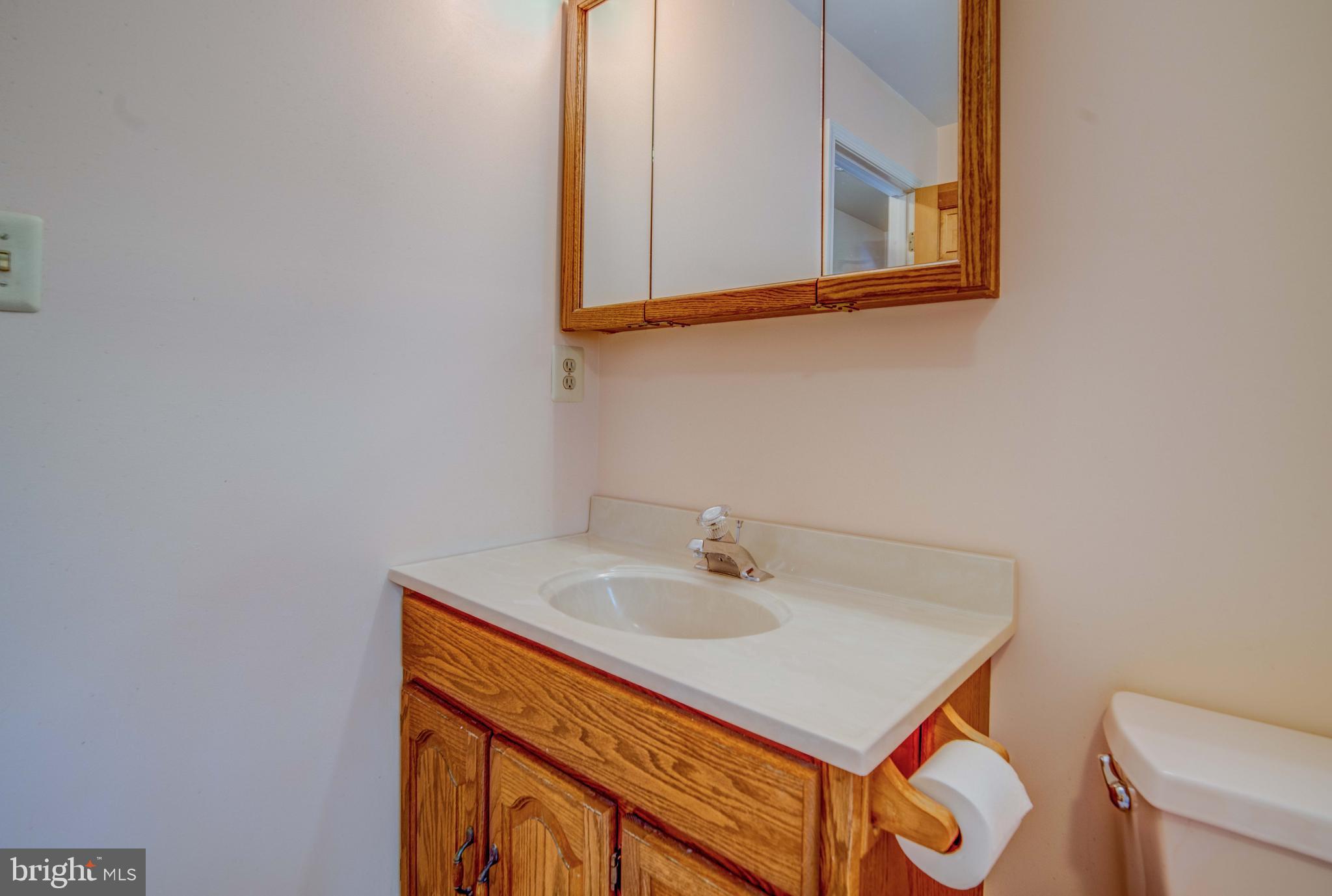 6380 Shady Side Road Shady Side, MD 20764 - Photo 60 of 95 Upper level hallway bathroom