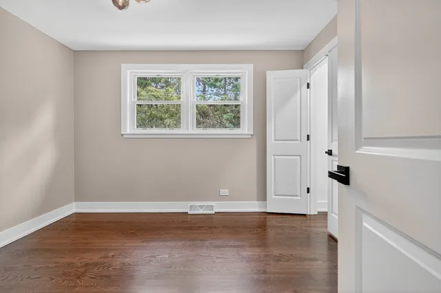 a view of livingroom with hardwood floor and window