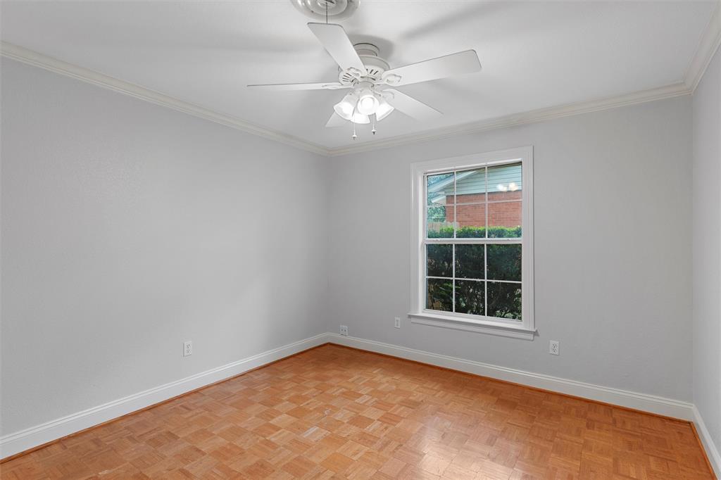 2131 Mountainview Drive Waco, TX 76710 - Photo 12 of 27 Empty room featuring crown molding and a ceiling fan