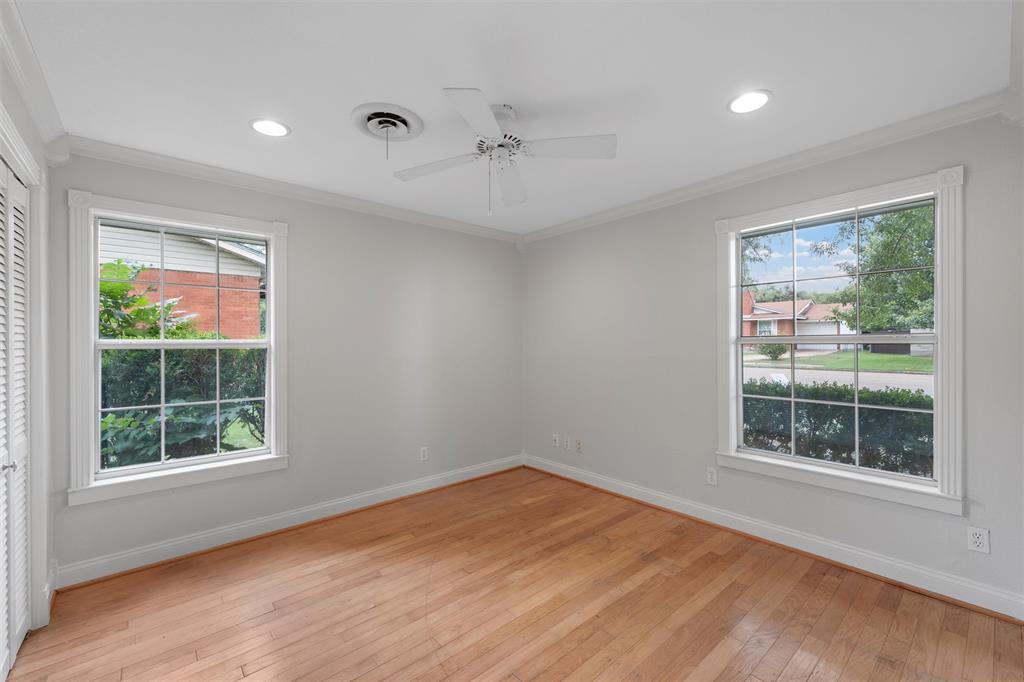 2131 Mountainview Drive Waco, TX 76710 - Photo 14 of 27 Spare room featuring ornamental molding, light wood-style flooring, plenty of natural light, recessed lighting, and ceiling fan