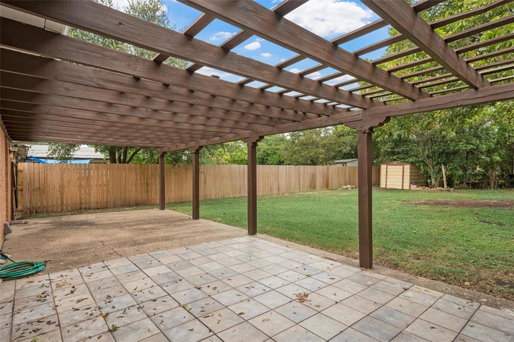 2131 Mountainview Drive Waco, TX 76710 - Photo 21 of 27 Fenced backyard featuring a shed, a patio, and a pergola