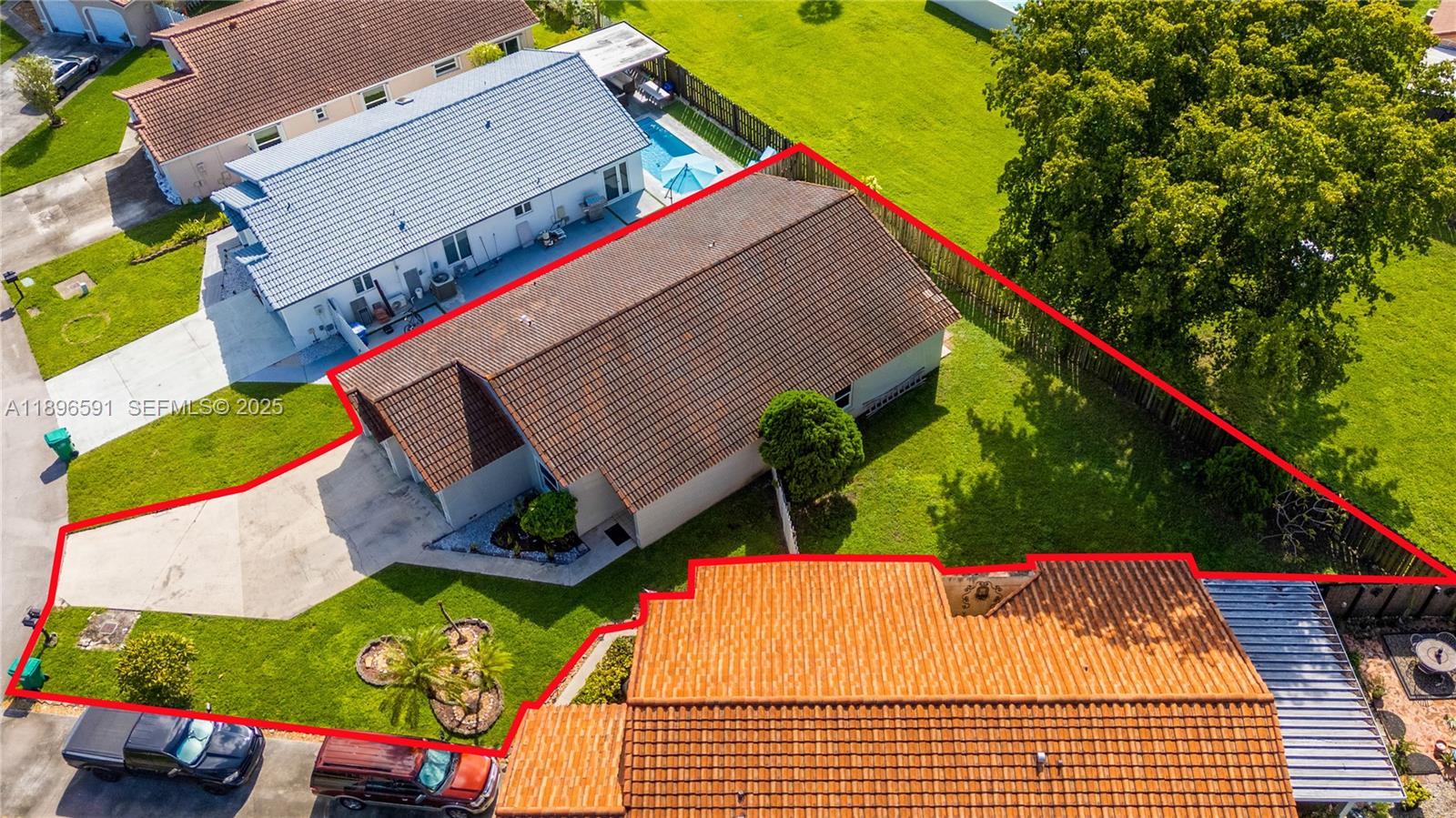 6090 Northwest 179th Terrace Hialeah, FL 33015 - Photo 28 of 29 an aerial view of a house