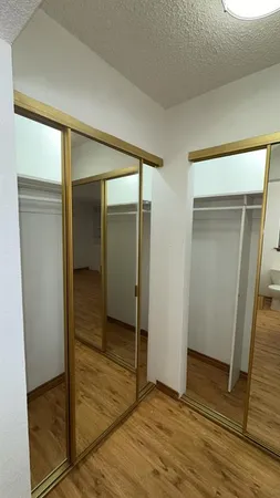 a view of an empty room and window