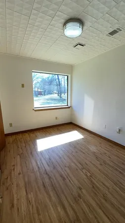 a view of storage and utility room with washer and dryer