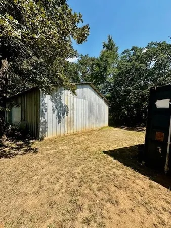 a view of backyard of house
