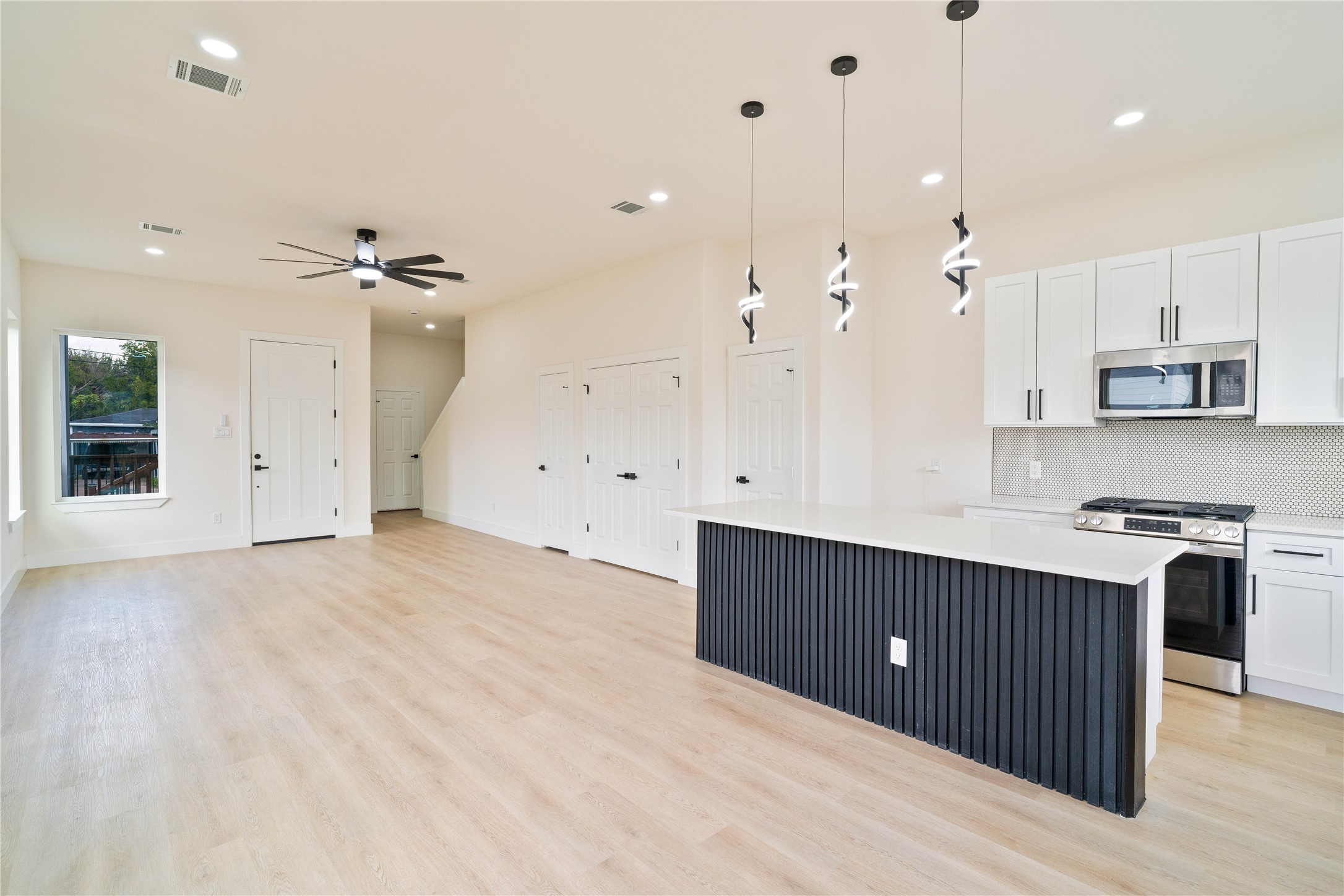 3210 Retta Street Houston, TX 77026 - Photo 10 of 10 Open floor plan a well sized island and tons of natural light make this space perfect for entertaining