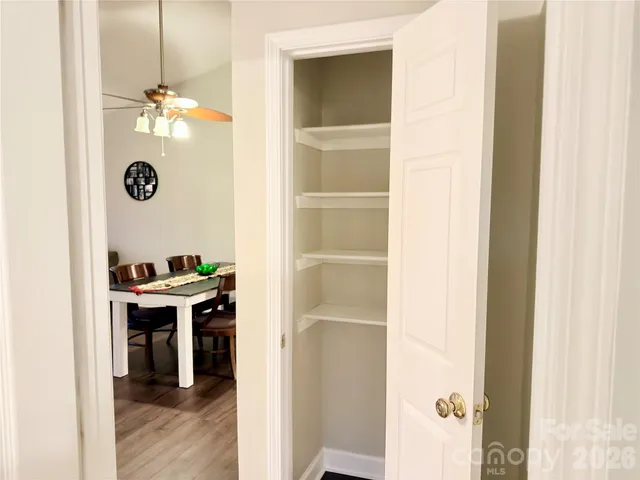 a view of a livingroom with storage & utility