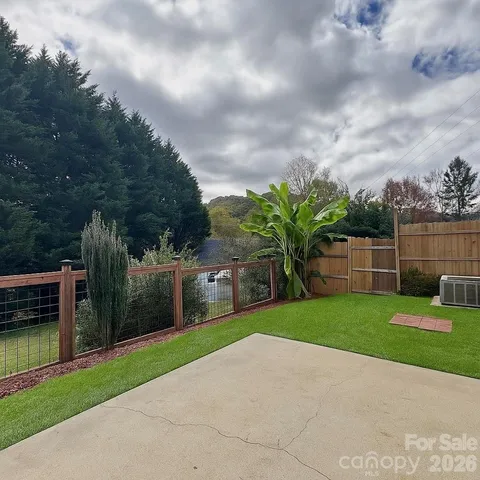a view of a garden with a slide