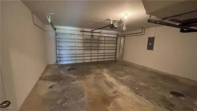 a view of empty room with stairs