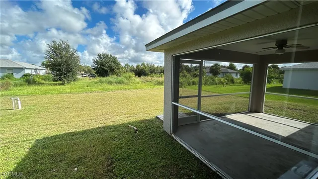 a view of a backyard with mountain view and a garden