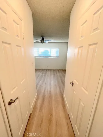 a bathroom with a sink toilet and a mirror