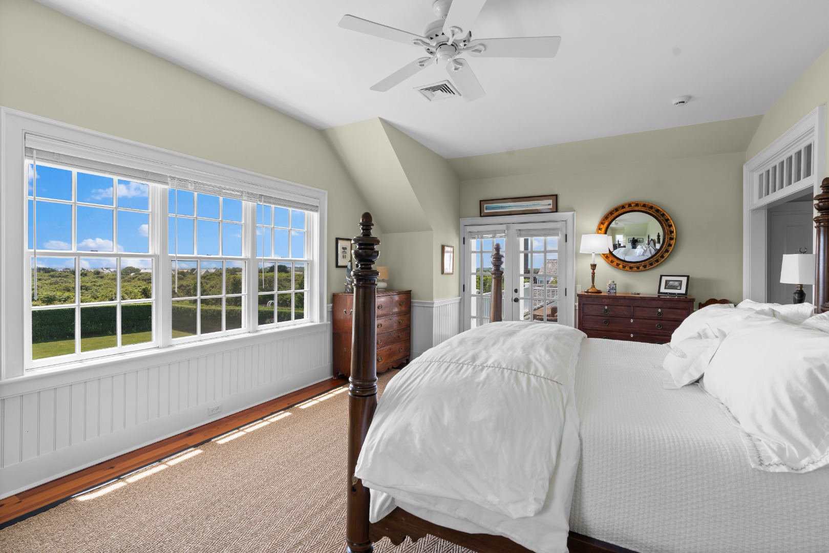 42 Main Street Nantucket, MA 02554 - Photo 19 of 40 a living room with furniture a chandelier and a window
