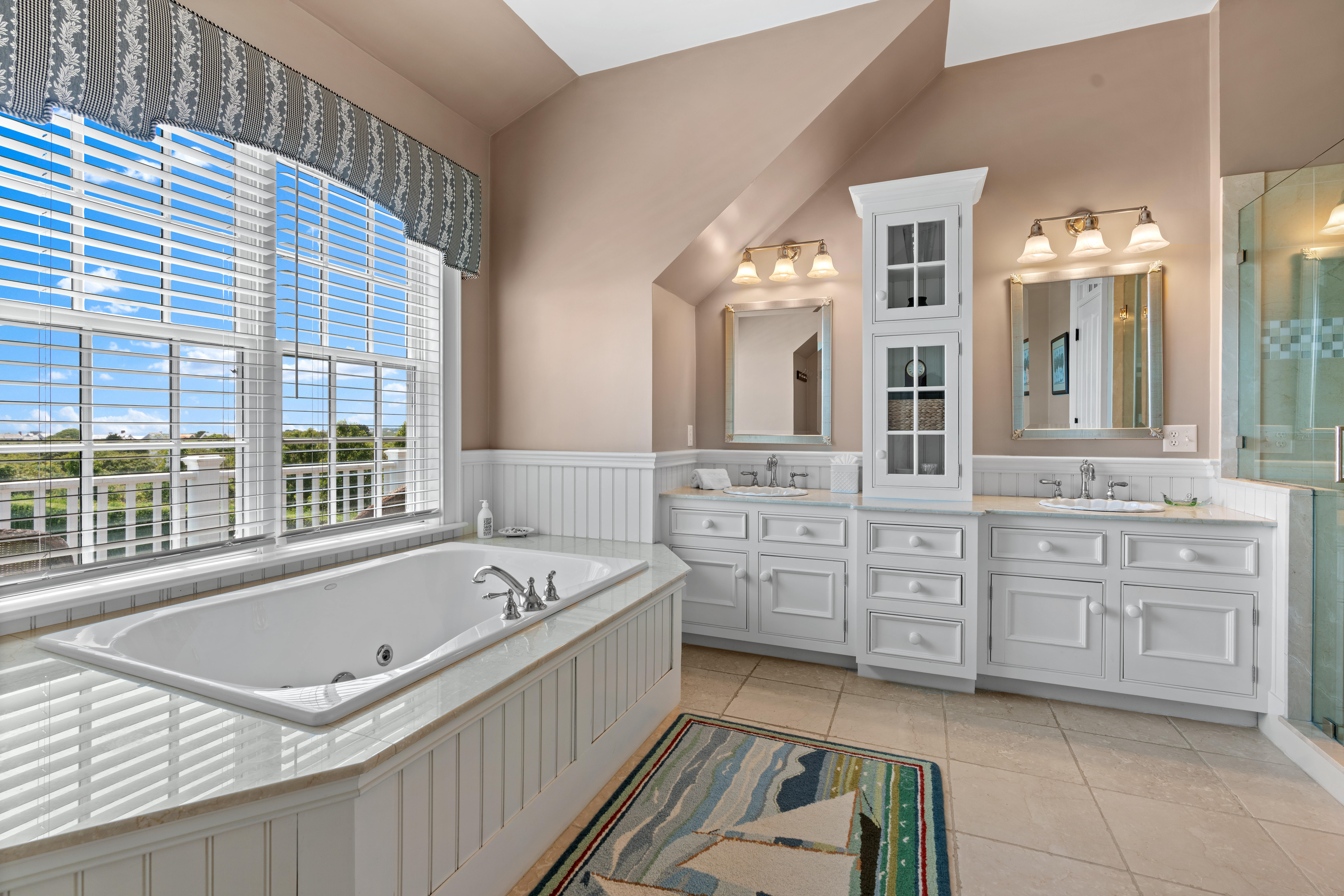 42 Main Street Nantucket, MA 02554 - Photo 21 of 40 a bathroom with a tub sink and mirror