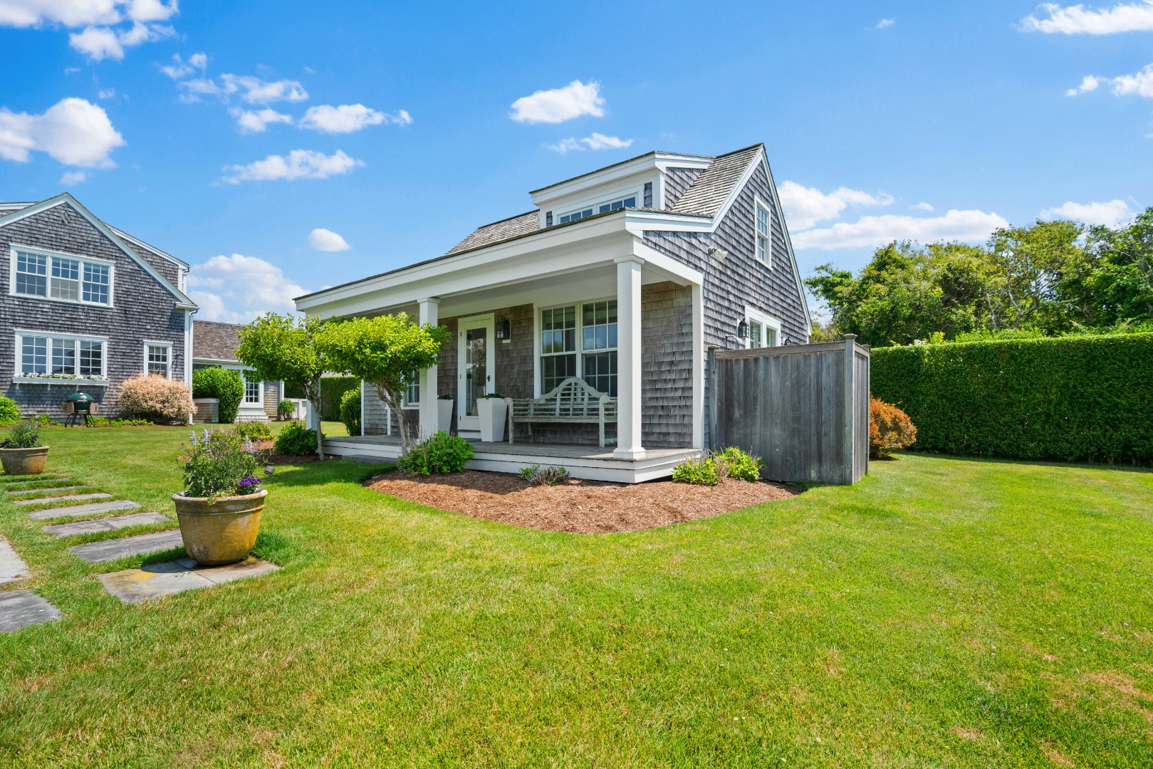 42 Main Street Nantucket, MA 02554 - Photo 31 of 40 a view of a house with backyard and sitting area