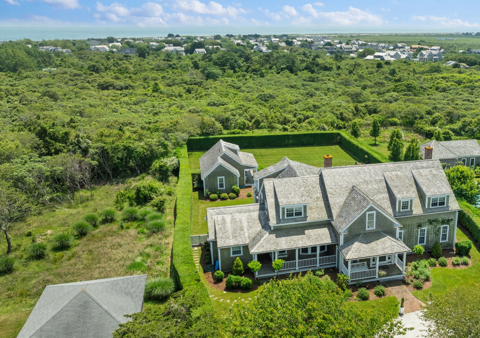 42 Main Street Nantucket, MA 02554 - Photo 4 of 40 an aerial view of a house with a garden