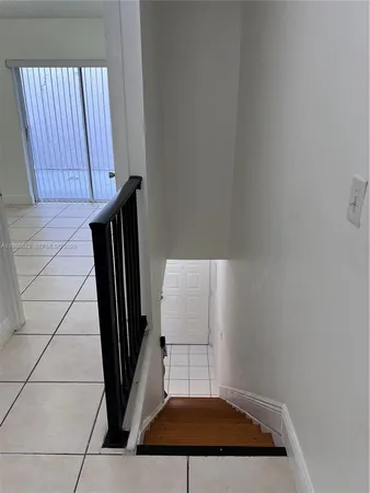 a bathroom with a toilet and shower