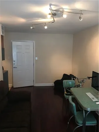 a workspace with furniture and wooden floor