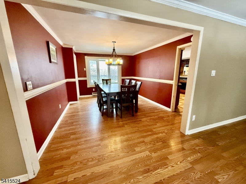 150 Karrville Road Port Murray, NJ 07865 - Photo 8 of 40 a view of a dining room with furniture and chandelier