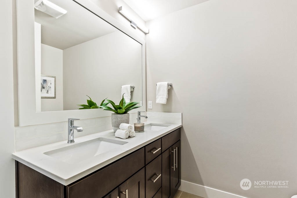 825 238th Place Southeast, Unit B8 Bothell, WA 98021 - Photo 23 of 32 a bathroom with a sink and a mirror