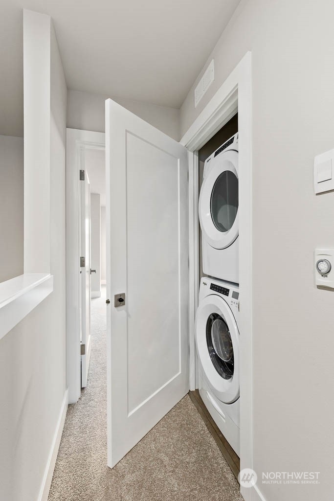 825 238th Place Southeast, Unit B8 Bothell, WA 98021 - Photo 27 of 32 a utility room with dryer and washer