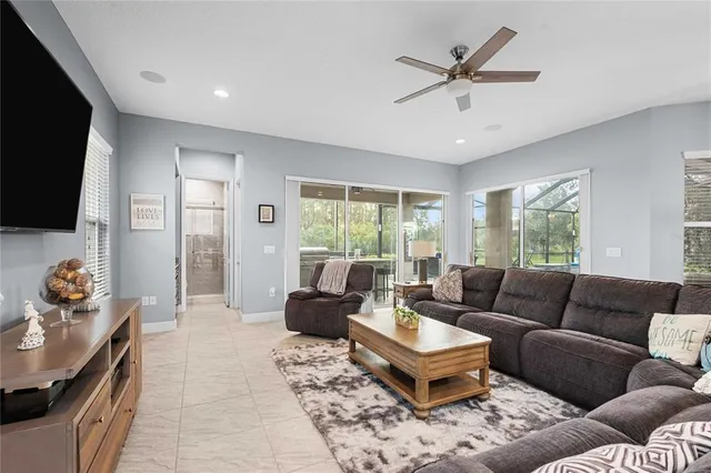 a living room with furniture and a window