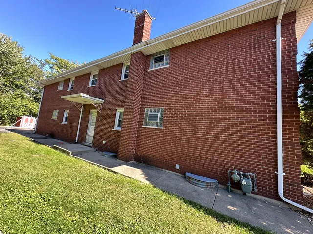 a view of an outdoor space with a house