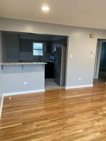a view of a kitchen with a sink