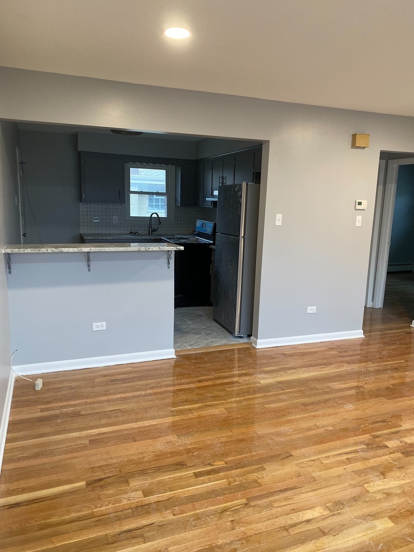 2290 182nd Place Lansing, IL 60438 - Photo 20 of 23 a view of a kitchen with a sink