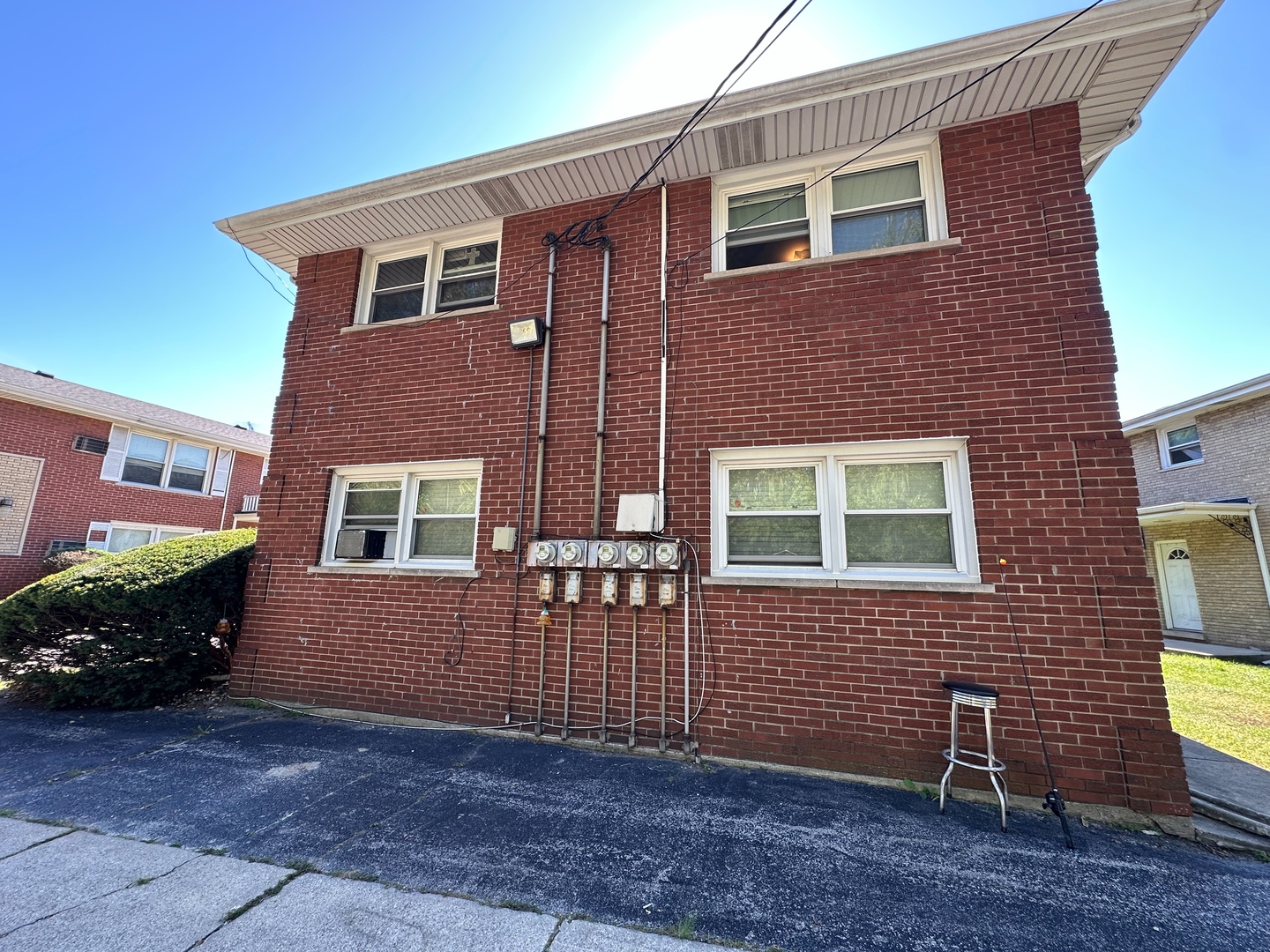 2290 182nd Place Lansing, IL 60438 - Photo 8 of 23 a front view of a house with a yard