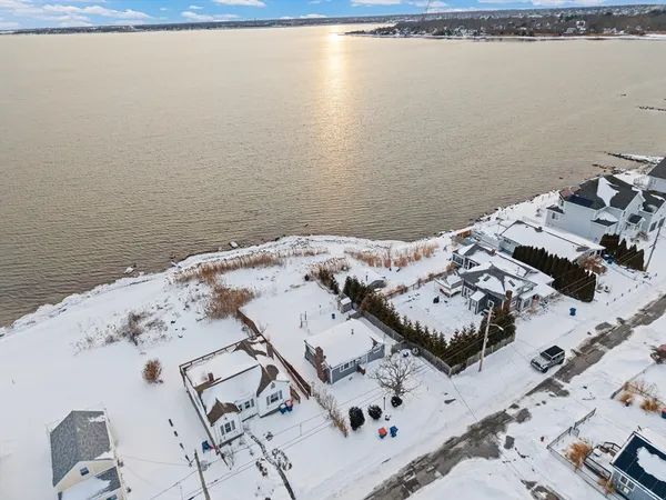 an aerial view of a house with outdoor space