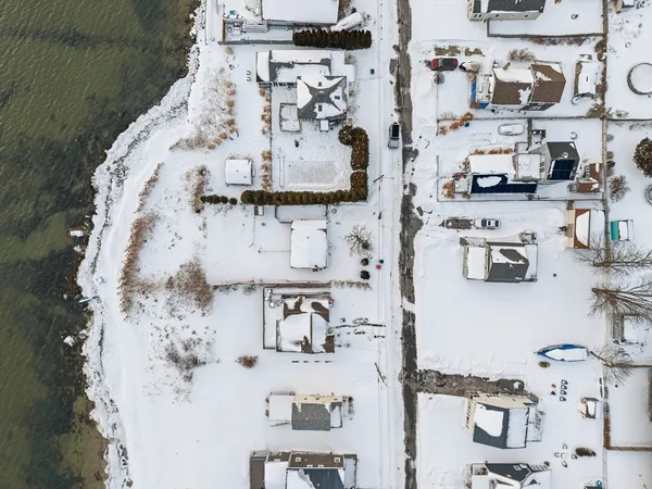 a view of a bedroom with a bed