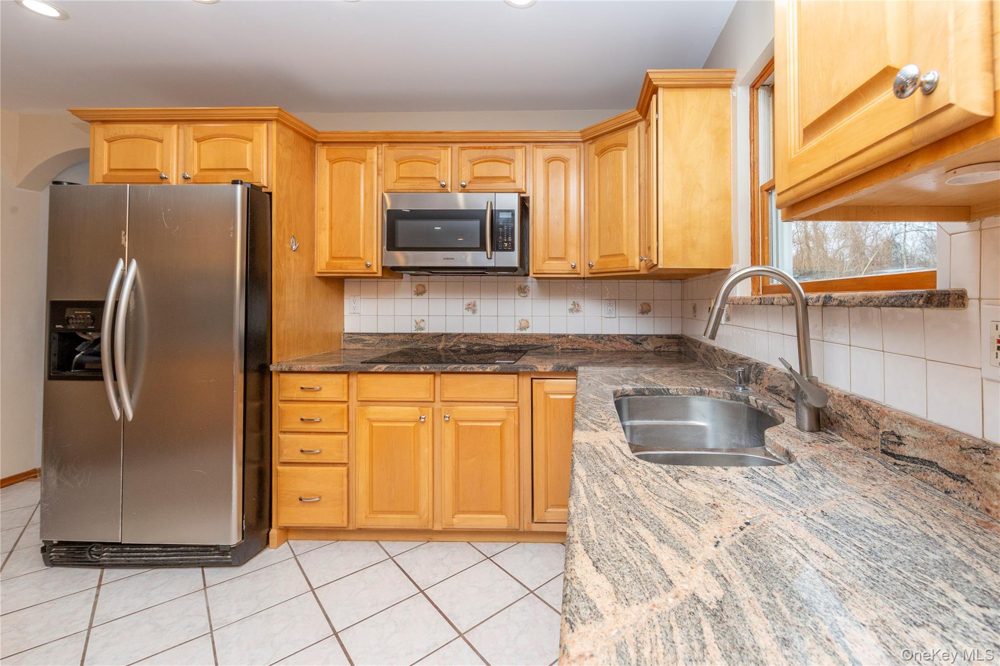 9 Caroline Drive Patterson, NY 12563 - Photo 13 of 50 Stainless steel appliances and granite counters.