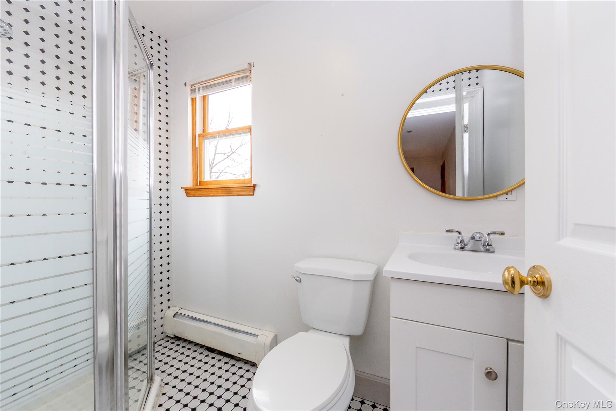 9 Caroline Drive Patterson, NY 12563 - Photo 16 of 50 First floor full bath with a shower stall.