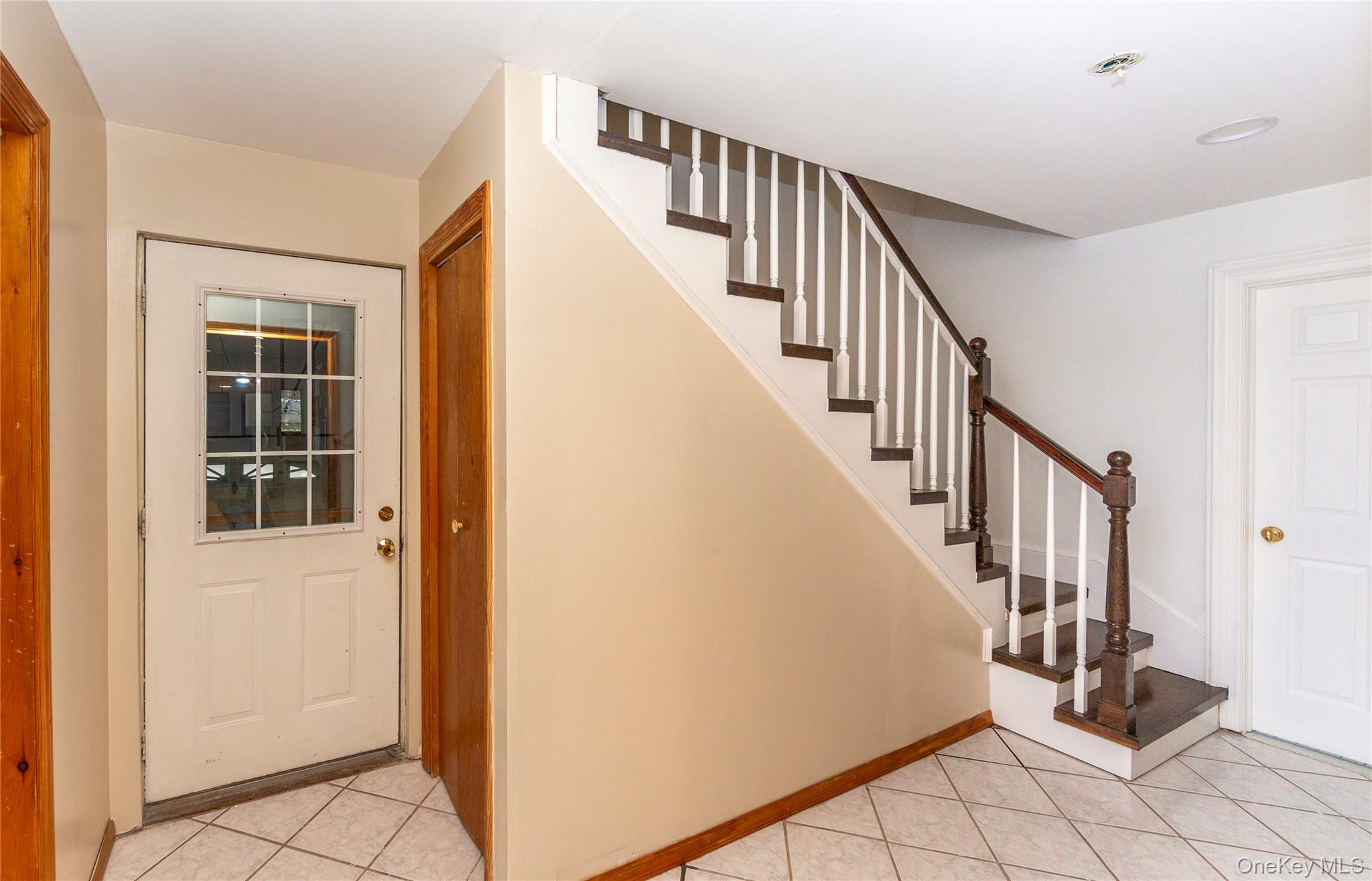 9 Caroline Drive Patterson, NY 12563 - Photo 21 of 50 Back staircase and door to the attached garage.