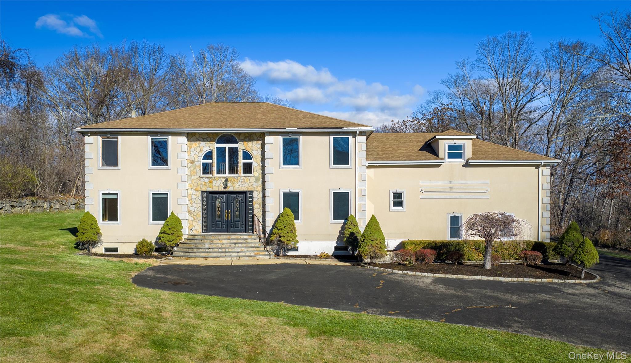 9 Caroline Drive Patterson, NY 12563 - Photo 4 of 50 This impressive 1998 Colonial offers the perfect blend of grandeur and privacy, with nearly 4,000 SF of living space.