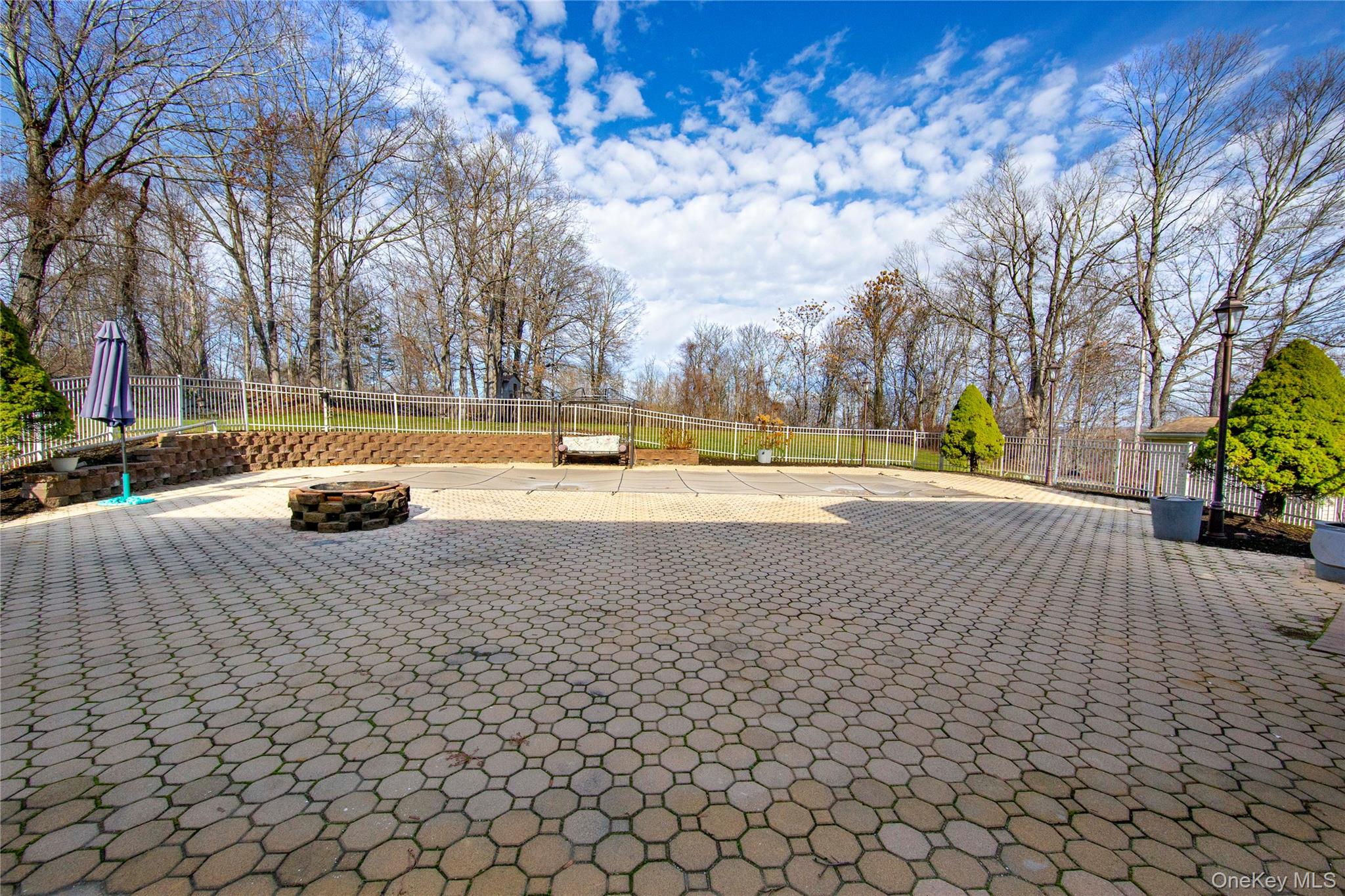 9 Caroline Drive Patterson, NY 12563 - Photo 41 of 50 The massive patio and firepit creates the ultimate setting for summer gatherings.