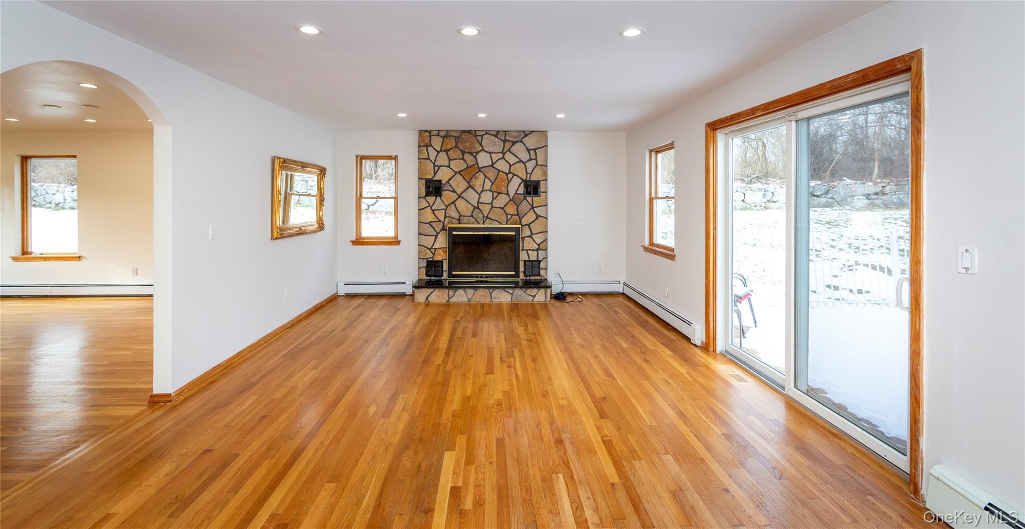 9 Caroline Drive Patterson, NY 12563 - Photo 9 of 50 The large family room is anchored by a cozy fireplace.