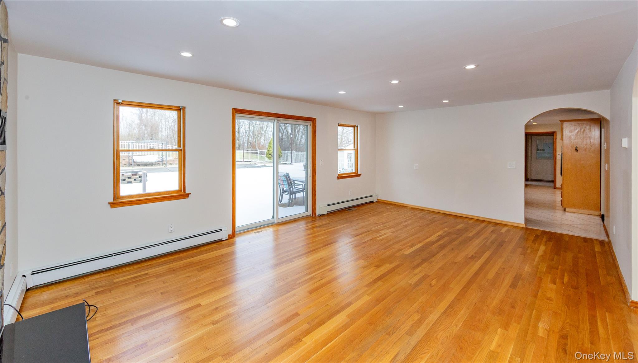 9 Caroline Drive Patterson, NY 12563 - Photo 10 of 50 Sliding glass doors lead to the rear patio.