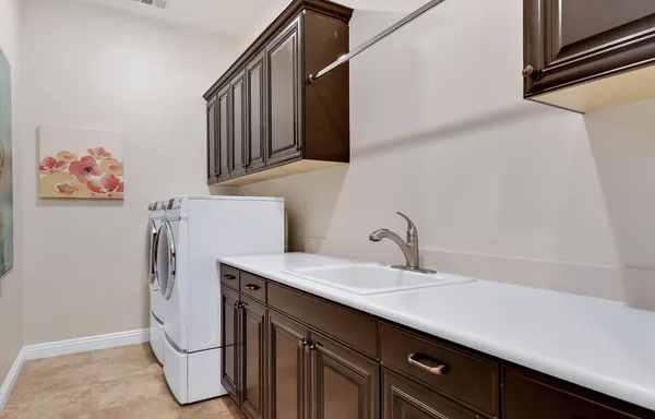 a bathroom with a sink a vanity and a mirror