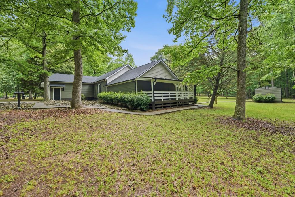 542 Knox Chapel Road Social Circle, GA 30025 - Photo 47 of 52 a front view of a house with garden