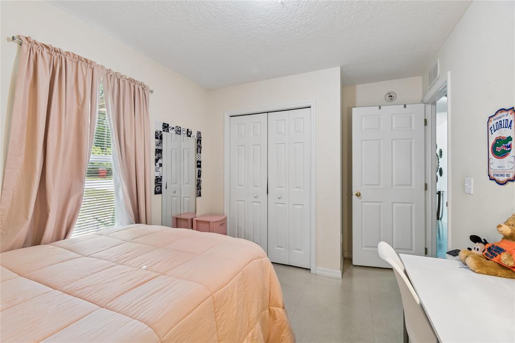 468 North Wheeler Avenue Inverness, FL 34453 - Photo 15 of 24 a bedroom with a bed and a window