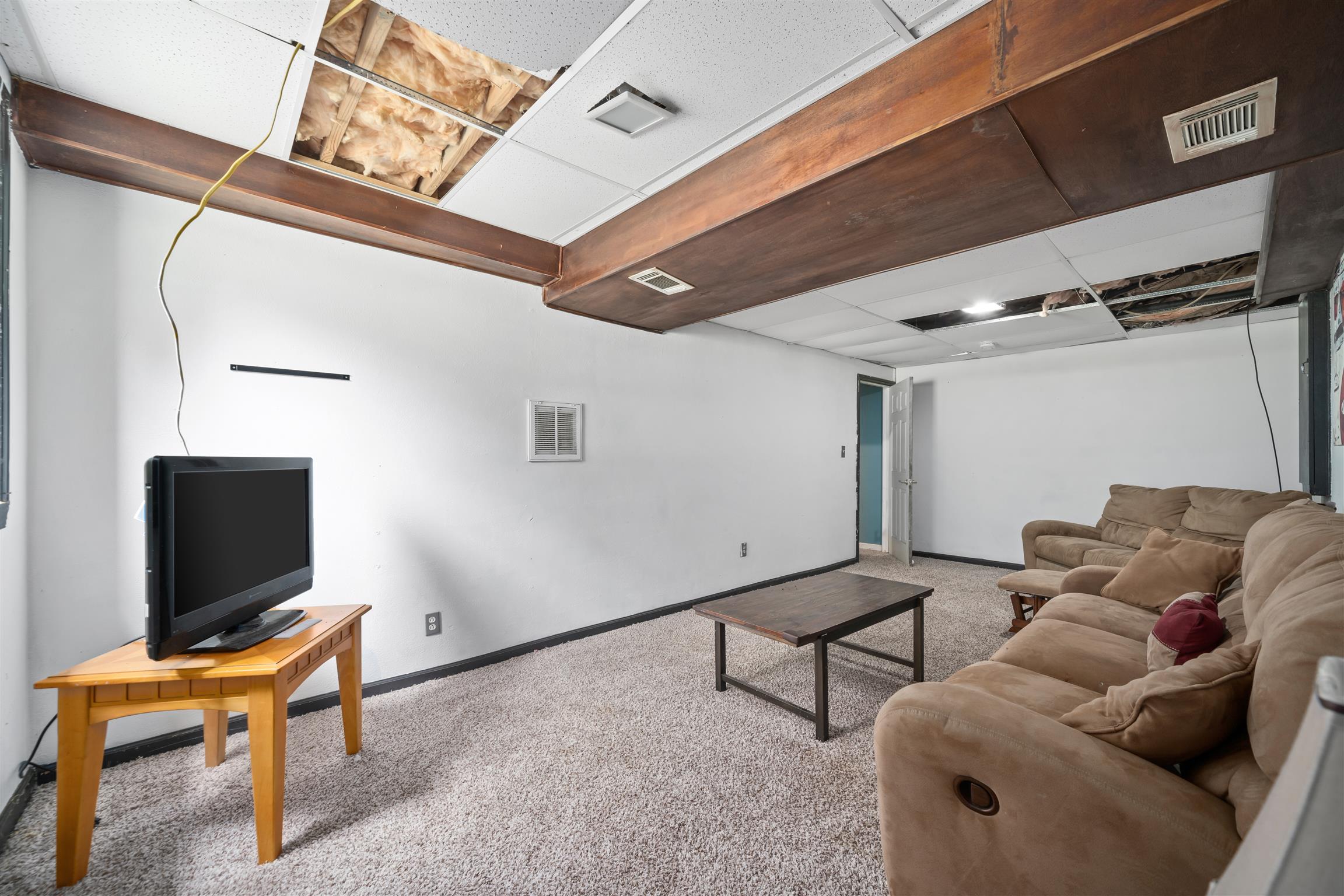 272 Shiloh Road Clarksville, TN 37042 - Photo 24 of 28 Finished Basement Rec Room (ceiling tiles have been repaired)
