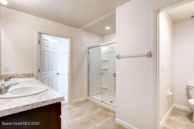 3757 Loggerhead Lane Mims, FL 32754 - Photo 11 of 43 HAYDEN MODEL MASTER BATHROOM 1