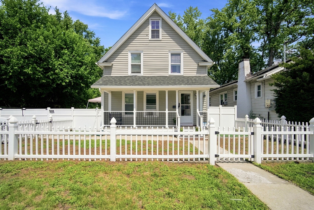 72 Switzer Avenue Springfield, MA 01109 - Photo 36 of 37 a house view with a garden